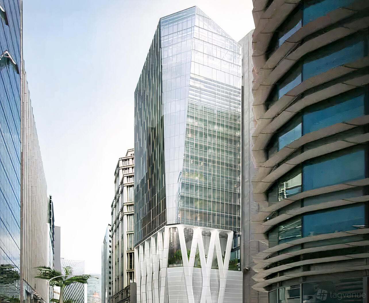 A glass-fronted office building with modern architectural details and structural columns at The Great Room - Afro Asia.