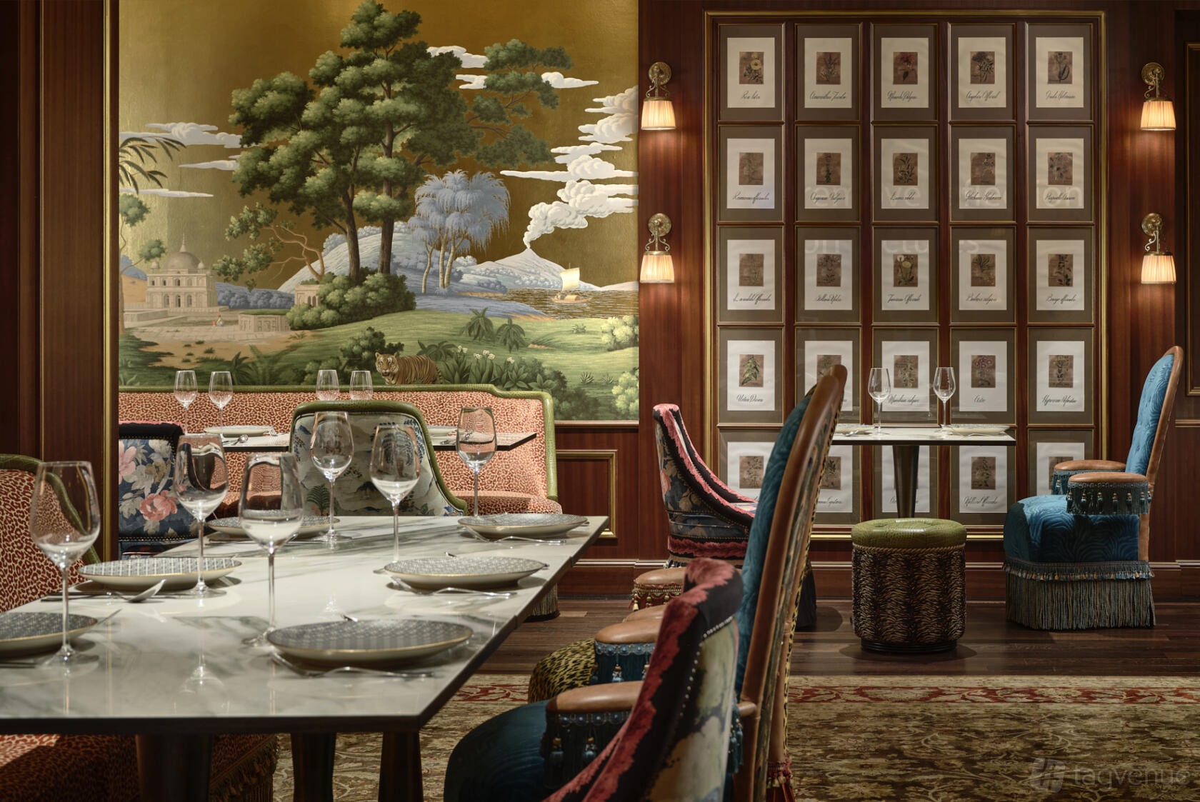 A hotel dining room with marble tables, patterned chairs, and a mural of trees at Maxwell Reserve, Autograph Collection.