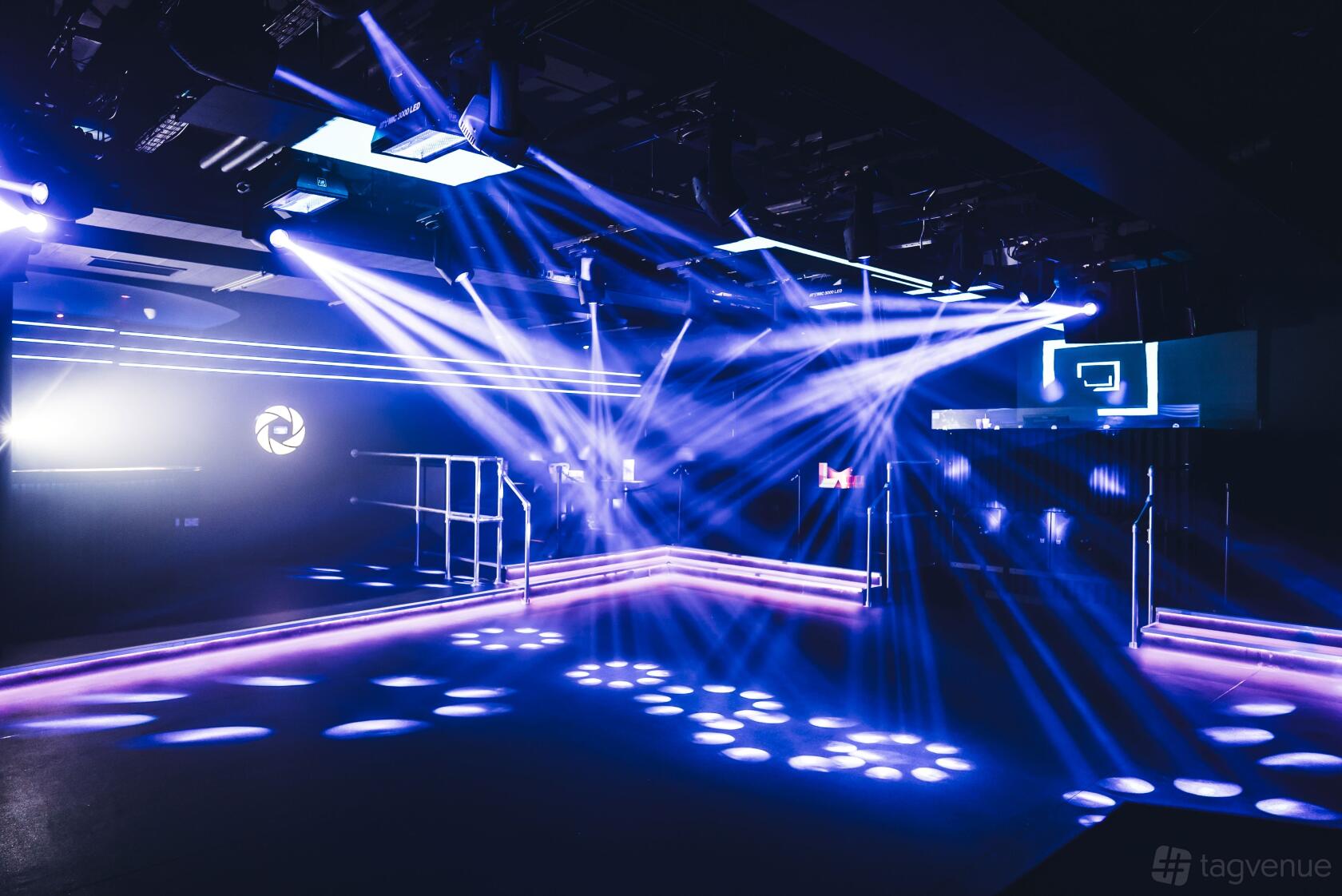 A nightclub with dynamic LED lighting, laser beams, and an open dance floor at Circuit Bristol.