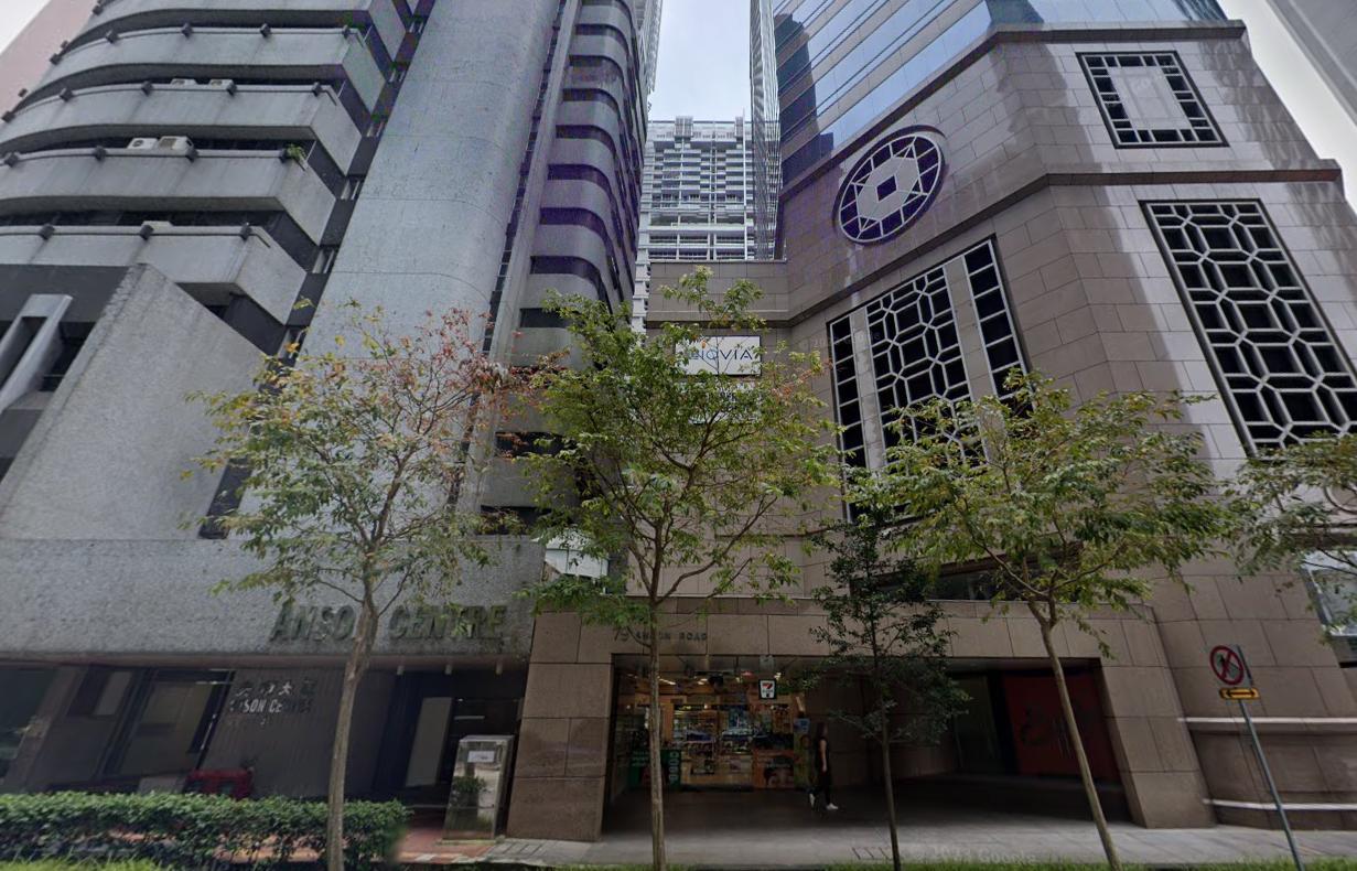 A versatile event space in a high-rise building with glass windows and street-level entrance at The Hive Tanjong Pagar.