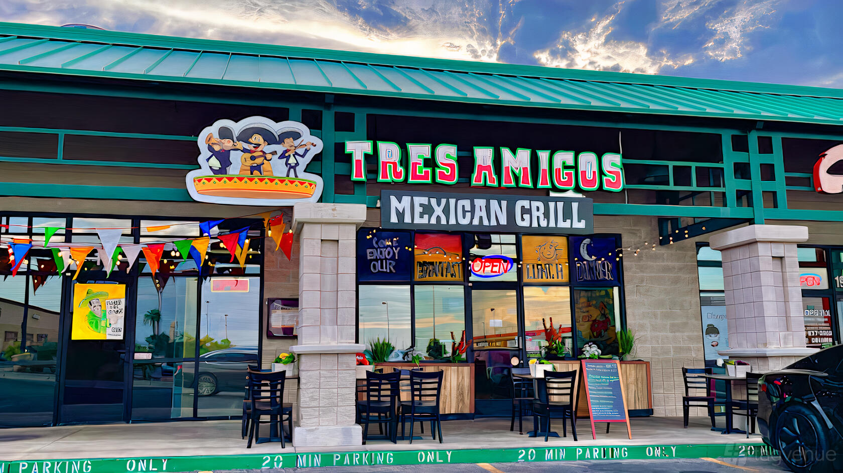 A restaurant exterior with colorful signage, festive banners, and outdoor seating at Tres Amigos Mexican Grill.
