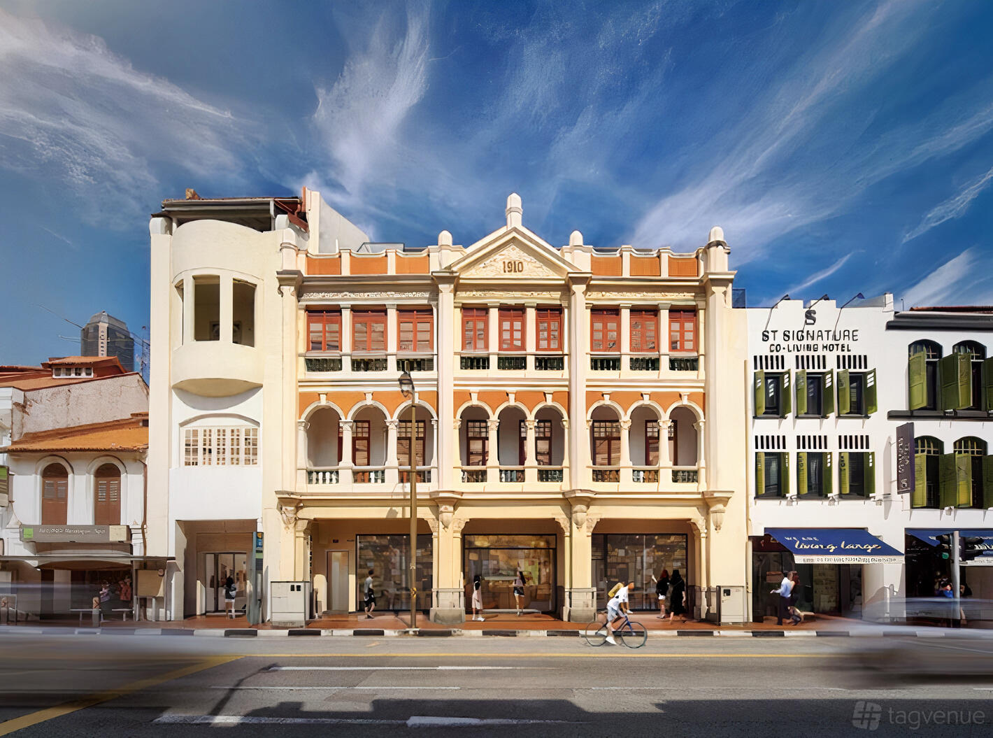 A coworking space with a restored heritage faƧade featuring ornate columns and large windows at The Great Room - South Bridge.