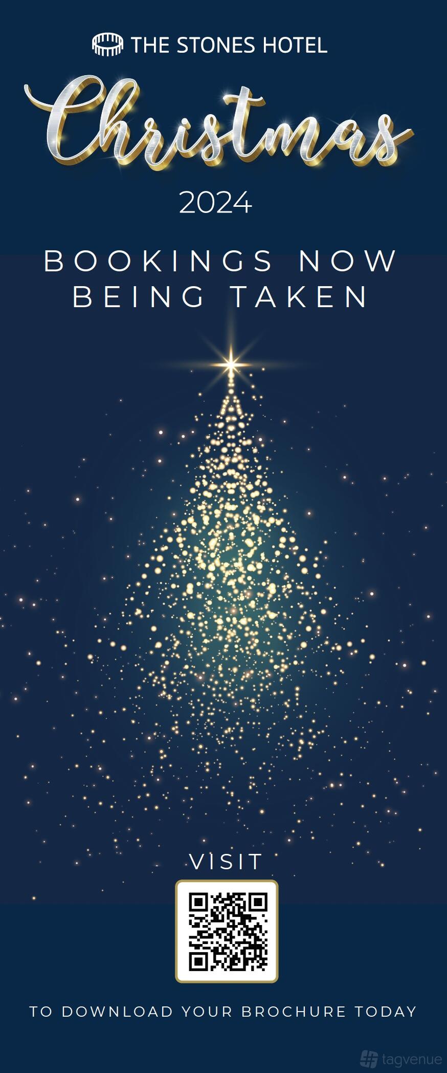A hotel event space with a holiday-themed graphic featuring a sparkling Christmas tree illustration at The Stones Hotel.